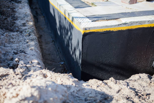 Professional Waterproofing technician working in Mishawaka, IN